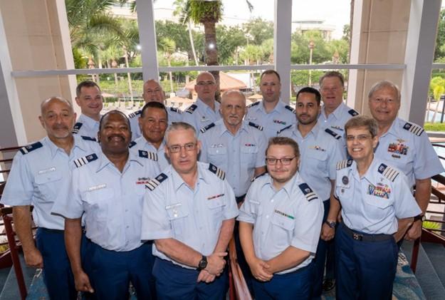 ORLANDO – AUX-12 students and instructors take a break from the classroom to pose for a group photo at the 2022 U.S. Coast Guard Auxiliary National Convention (NACON). NACON is the annual meeting of senior Auxiliary and Coast Guard leaders to discuss policy and set future goals and objectives for the Auxiliary as well as a location for various training seminars for members. U.S. Coast Guard Auxiliary Photo By: Auxiliarist Robin Priestley.